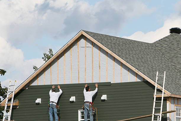 Professional Siding technician working in Orange, TX